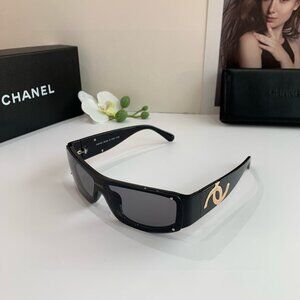 Chanel Women's Black and Gold Sunglasses